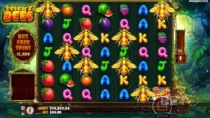 Pragmatic Play's Sticky Bees slot game showing bee super wild symbols activating sticky wild positions on the grid.